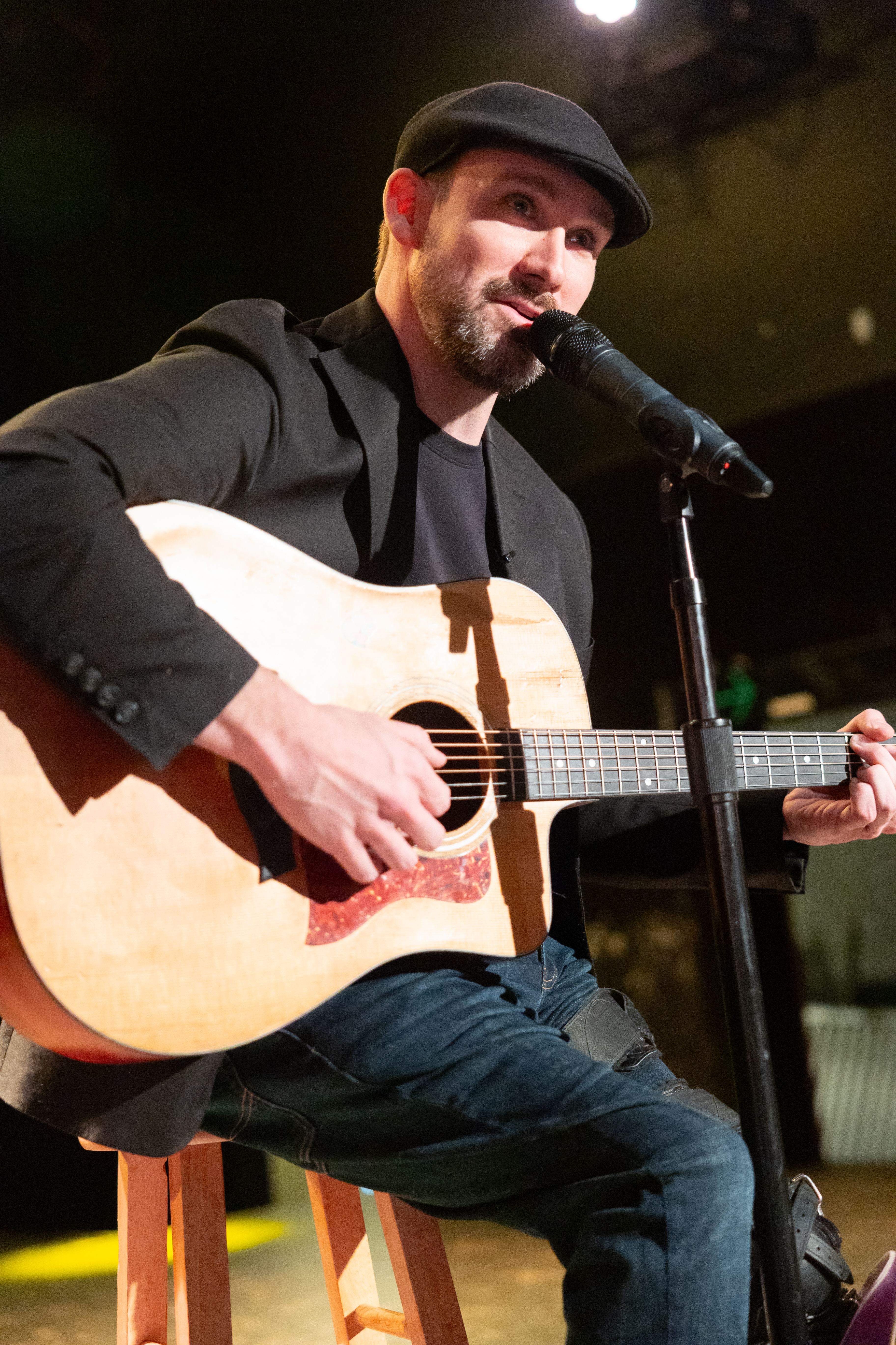 Chris Hendricks performing on stage